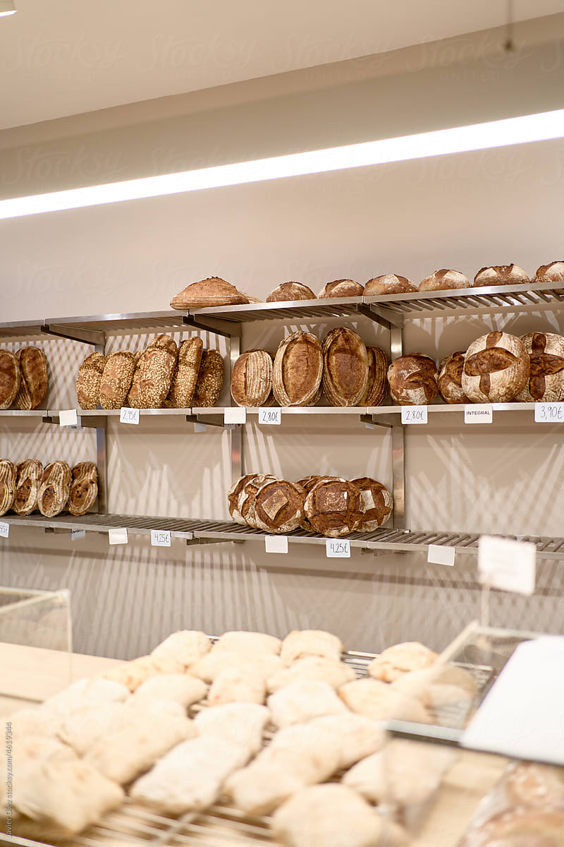 Shelves with assorted bread in bakery
