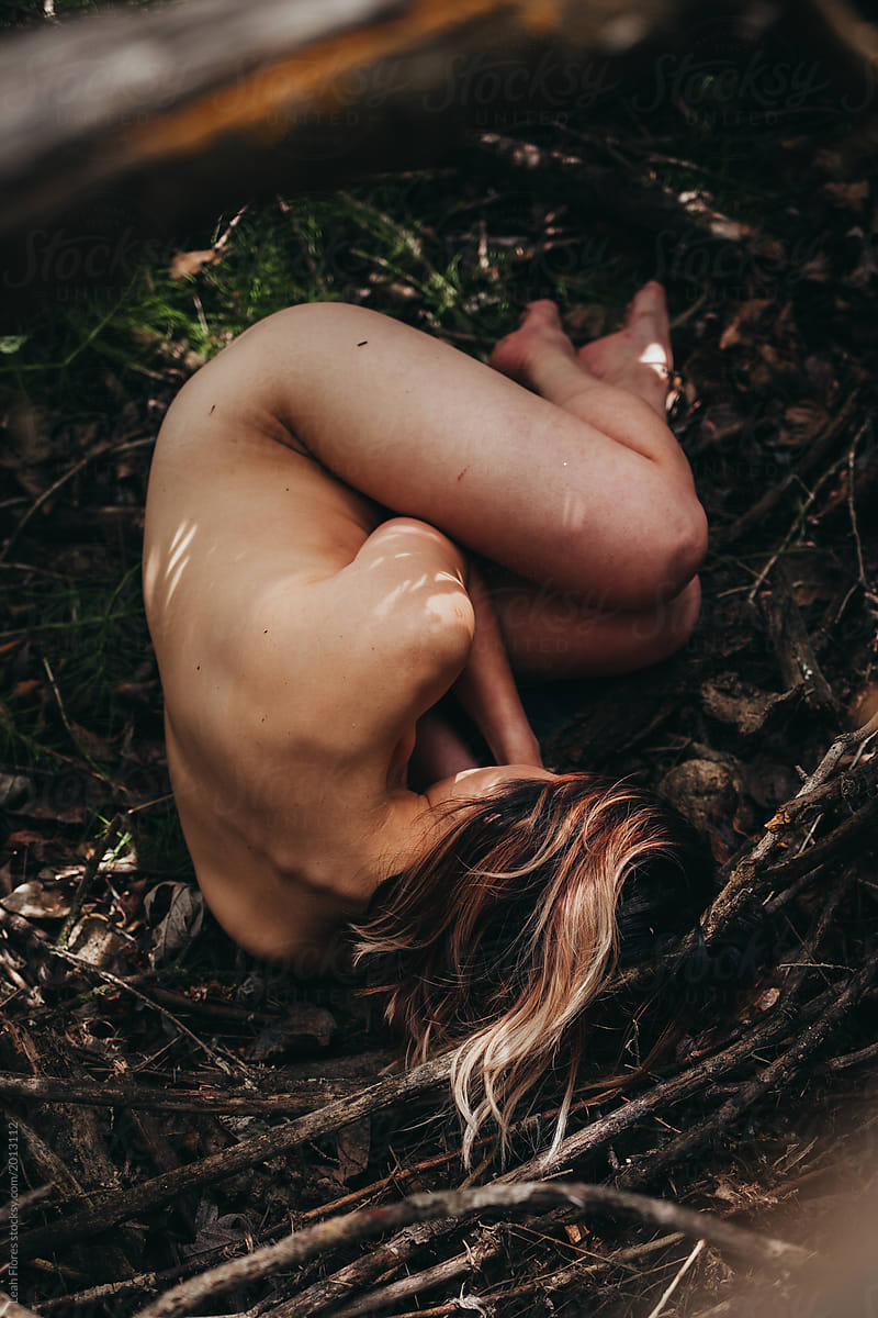 Nude Woman Lying On Ground In Forest By Stocksy Contributor Leah