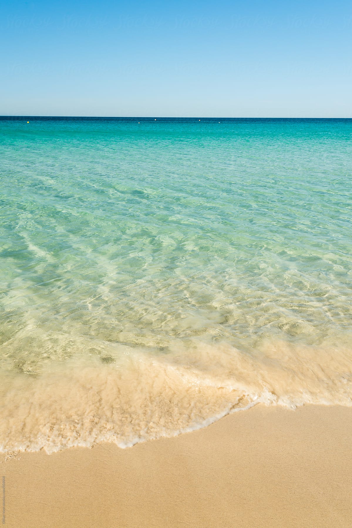 Beautiful Beach With Golden Sand And Crystal Clear Aqua Blue Water
