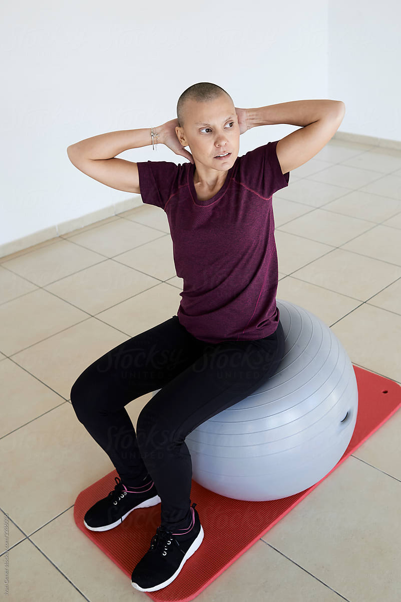 Pilates stretching with fitball.