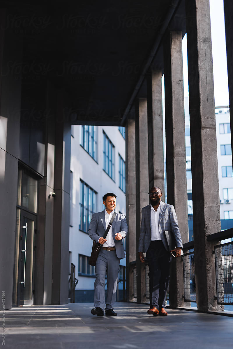 Man walking with colleague at office space