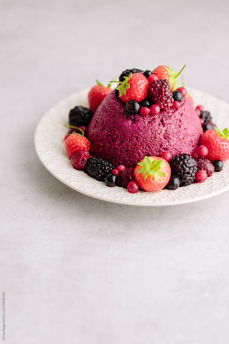 English Summer Pudding on plate with berries