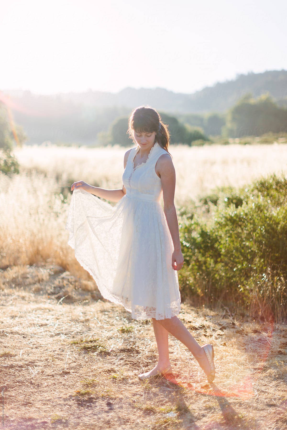 Woman in Lace, Vintage Dress Standing in Field