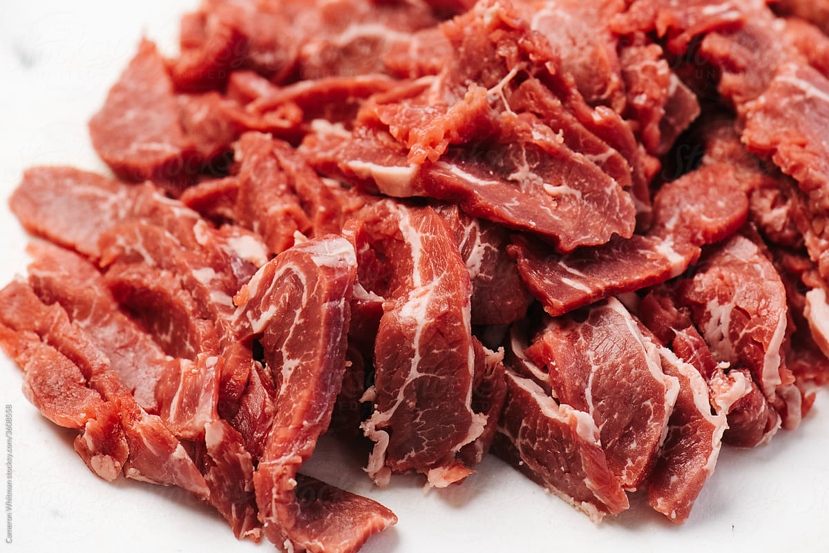 Raw sliced flank steak