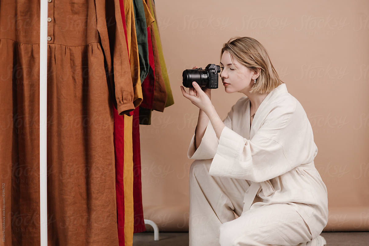 Woman taking picture of stylish apparel