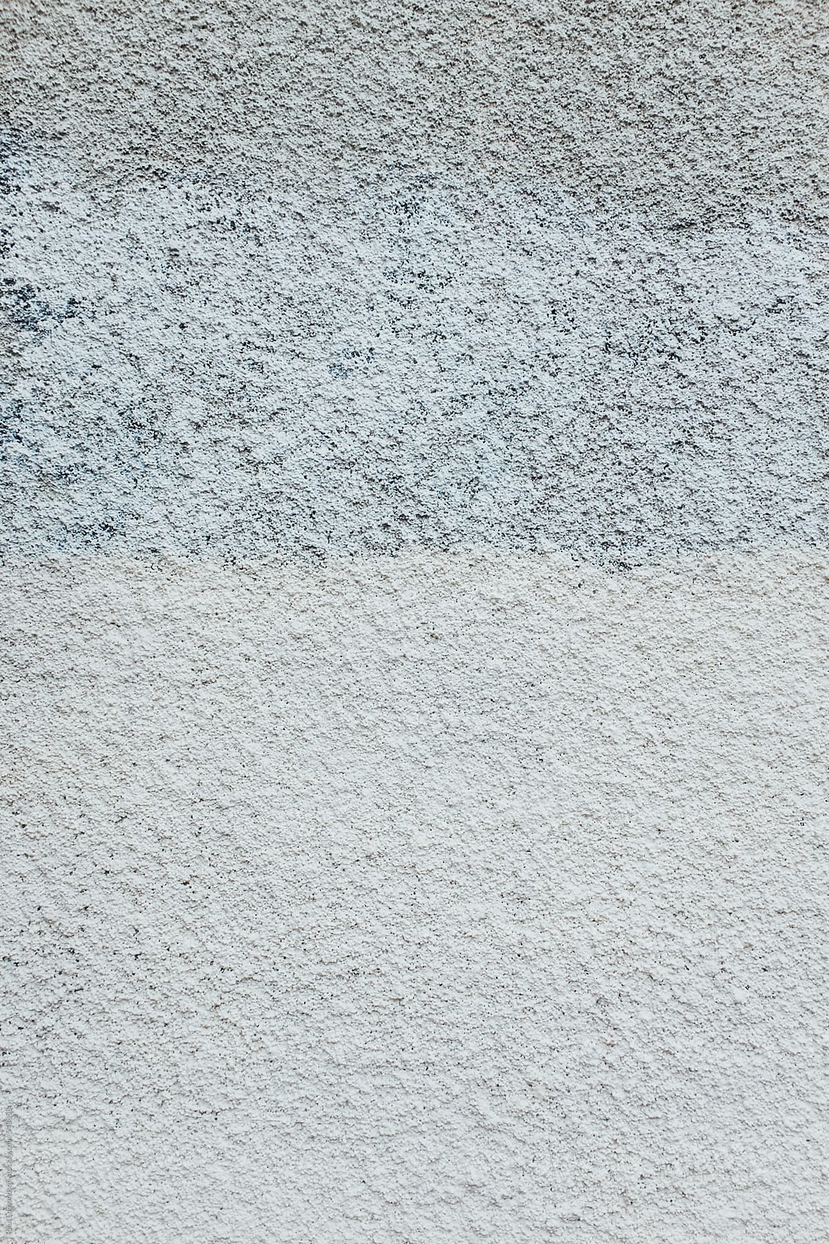 Close up of paint covering stucco wall
