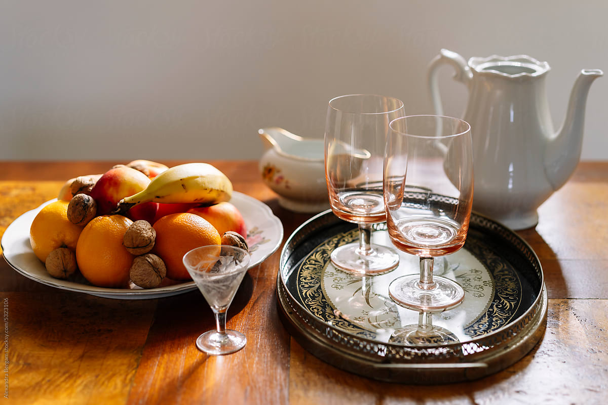 Fruit Plate, Goblet Glasses On Tray And Ceramic Pitcher Arrangement by  Stocksy Contributor Alexandra Bergam - Stocksy