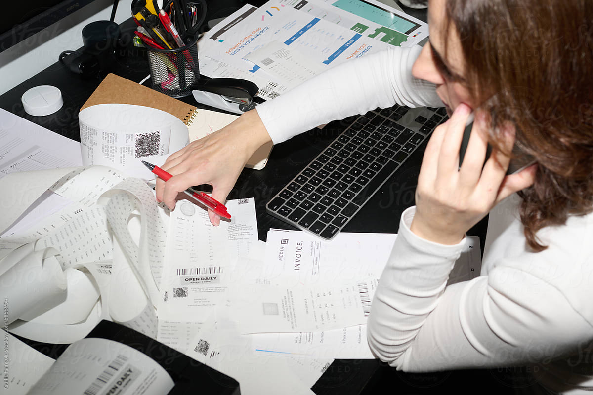 Phone call while reviewing business receipts