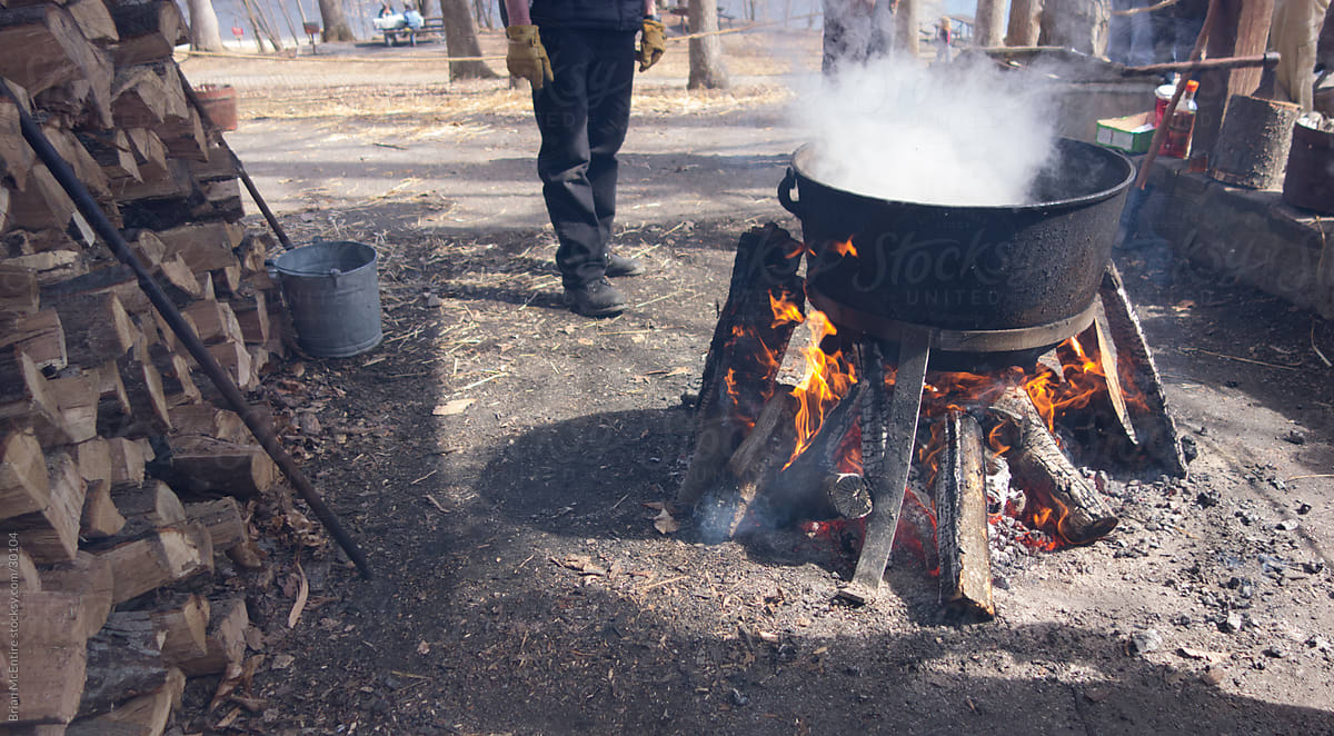 Making Maple Syrup: Reducing Sap in Boiling Cauldron Over Fire