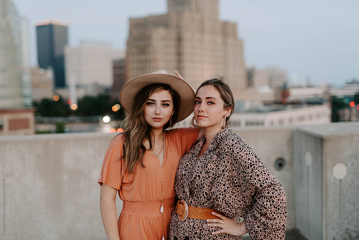 Two girlfriend on a rooftop