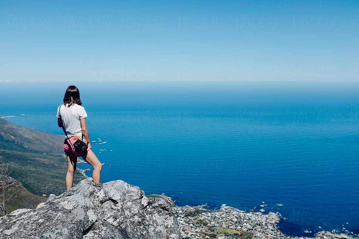 Woman taking in the view from the top of Table Mountain