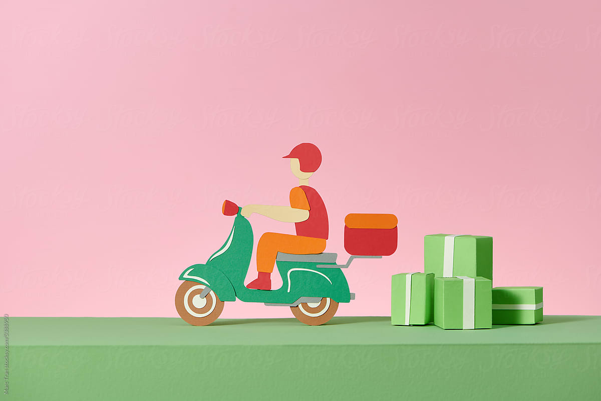 Delivery man riding motorcycle on pink background.