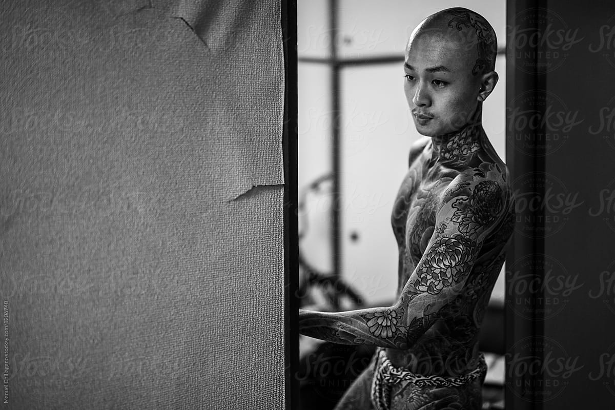 Young tattoo apprentice preparing for a photo shooting