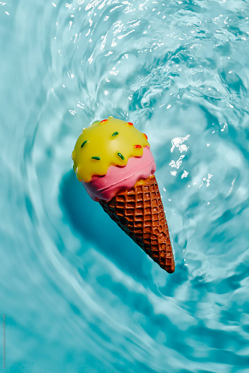 toy ice cream cone floats on the water