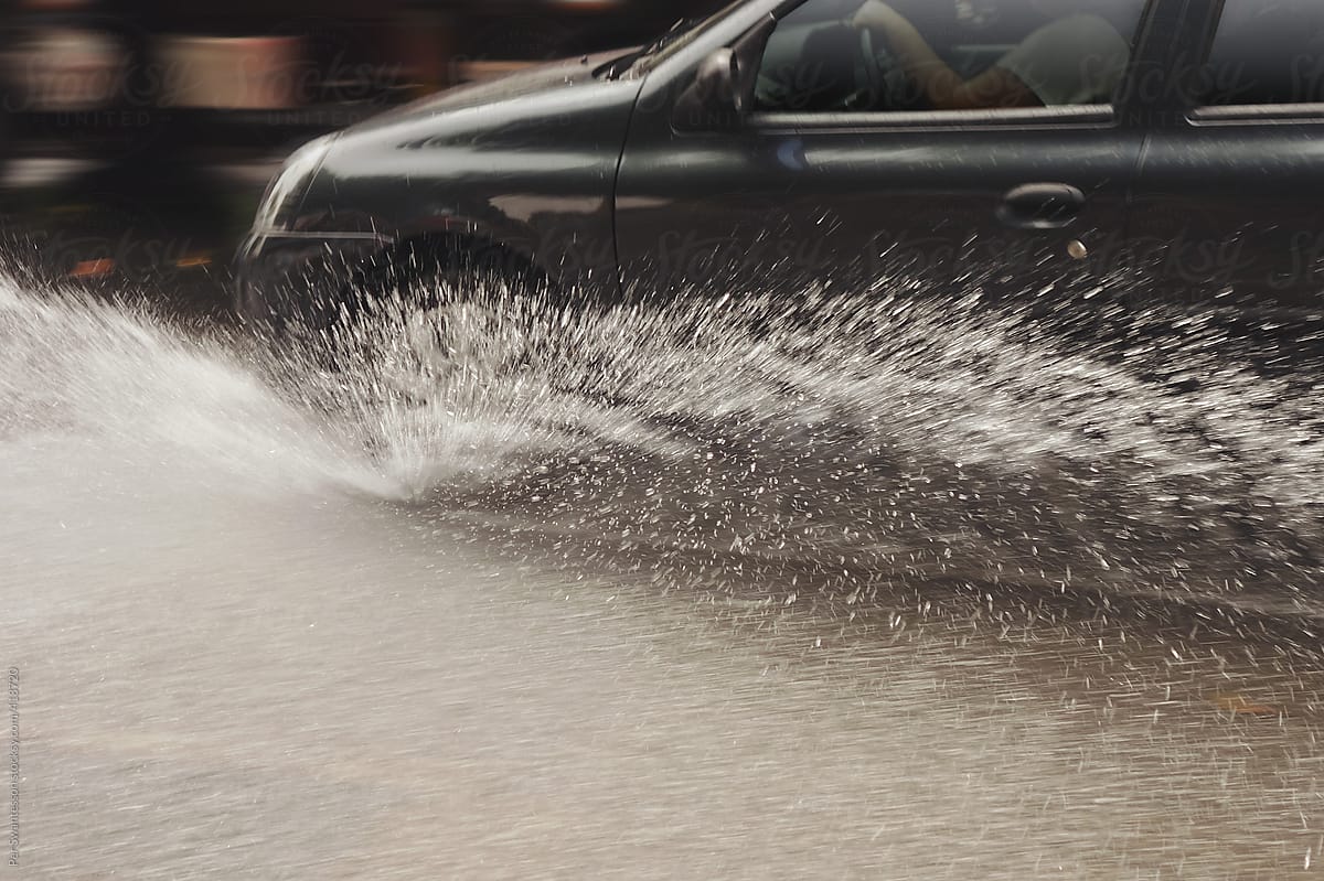 Rain weather: Car in rainy traffic