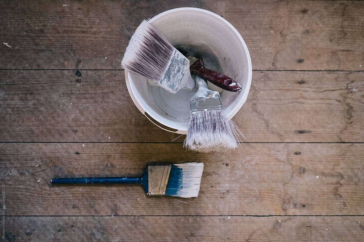 Paint brushes in a bucket