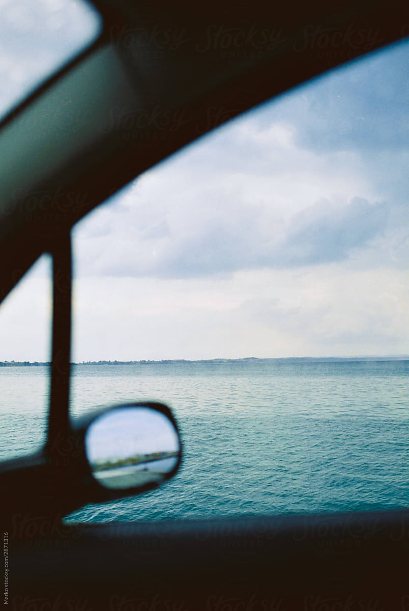 View on sea through car window