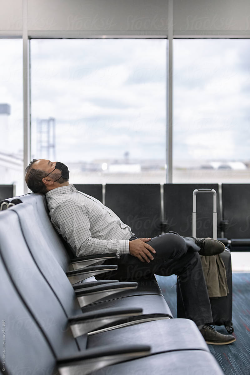 Travel: Tired Traveler Takes Nap Before Flight