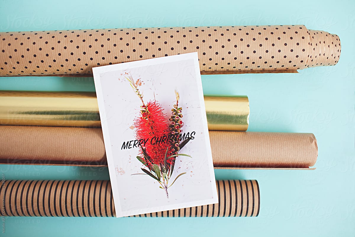Making gift cards for Christmas presents, decorated using native Australian bottle brush flower