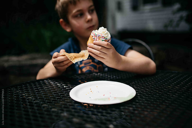 Child eating a cupcake