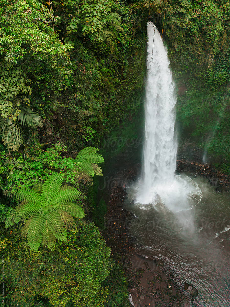 Aerial view of scenic tropical waterfall