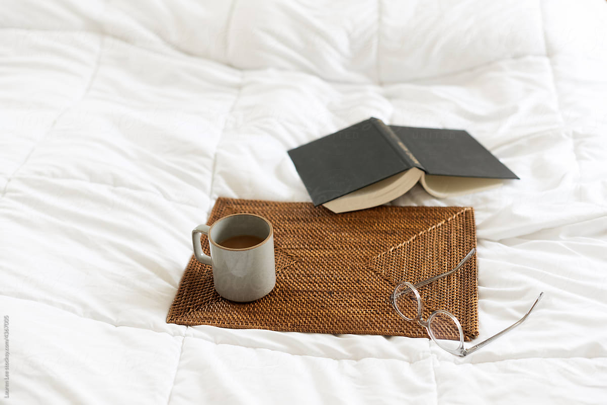Coffee and book in bed