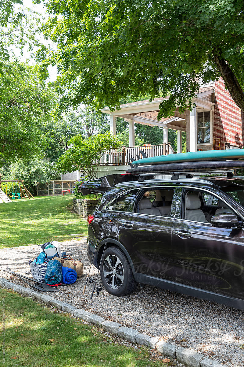 Summer vacation Packing luggage in car for family road trip