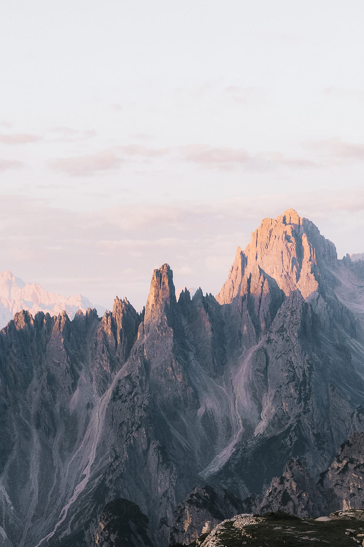 Dolomiti mountains during the sunrise coloured in pink, blue and velvet tones