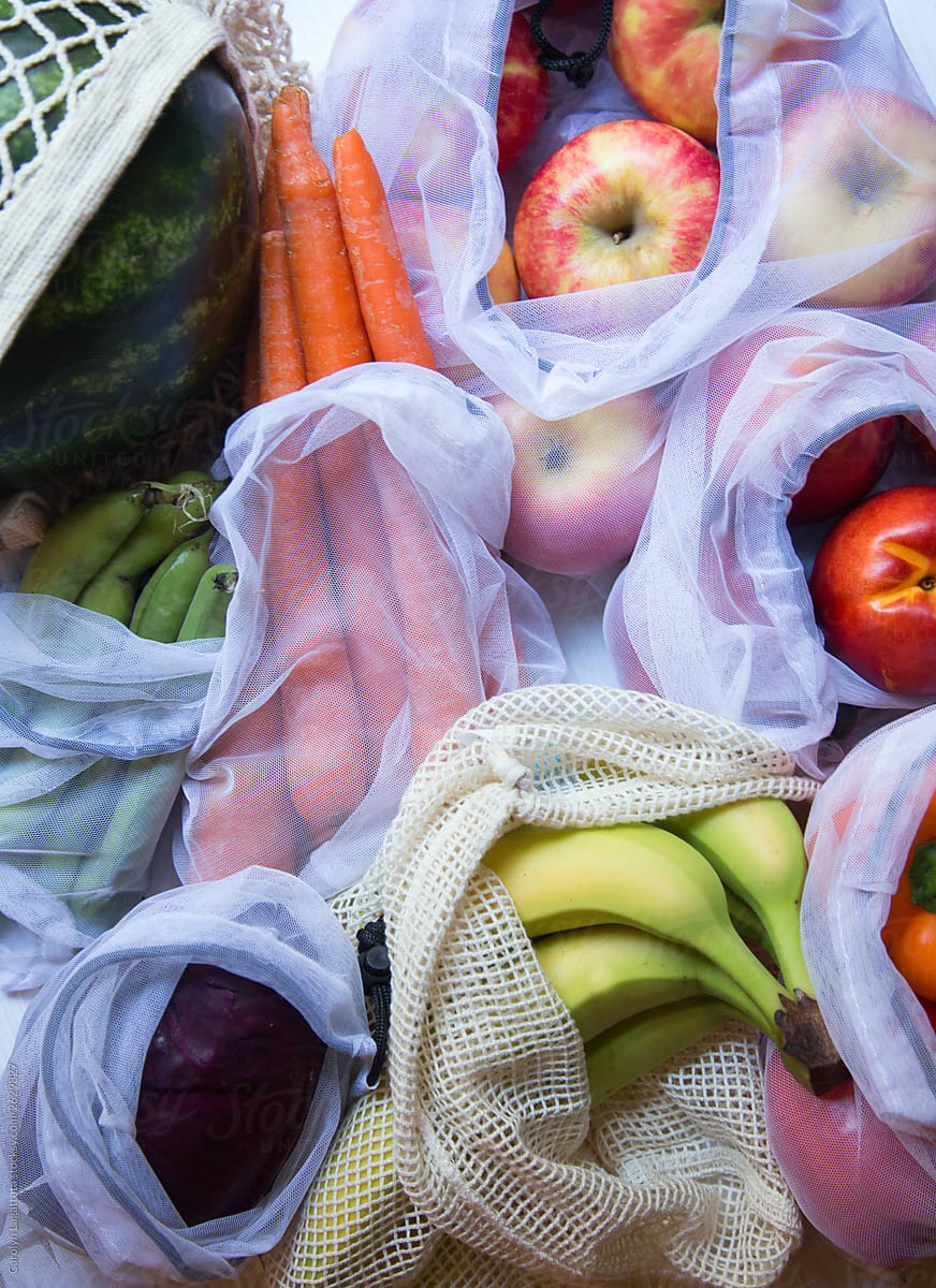 Fruits and vegetables in reusable bags