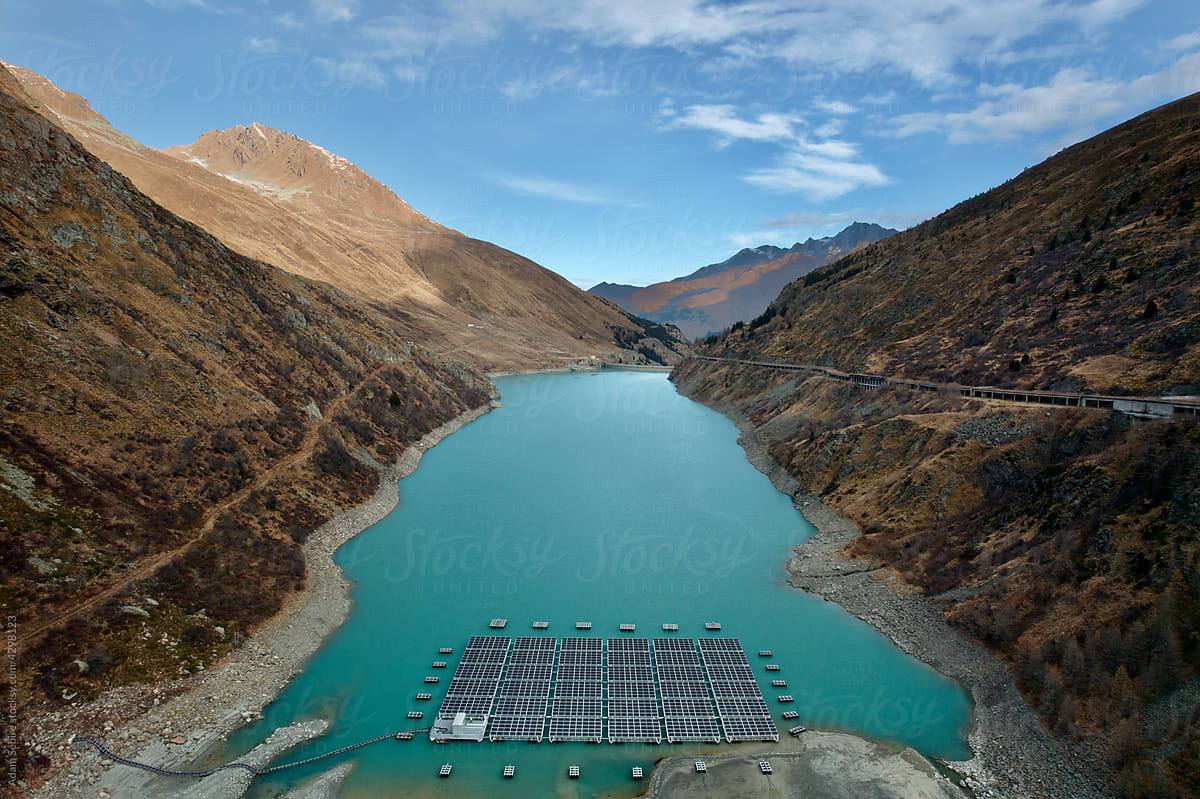 Renewable energy - solar cells float on hydroelectric lake