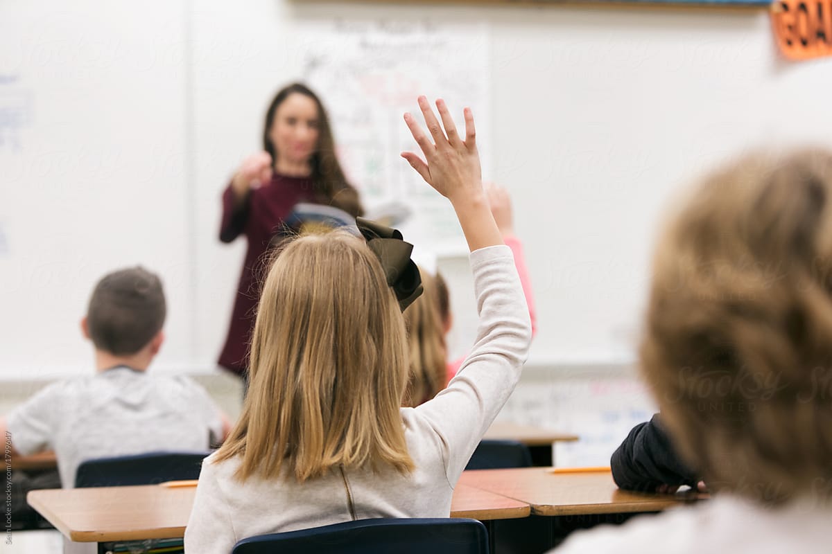 Classroom: Girl Student Raises Hand In Class