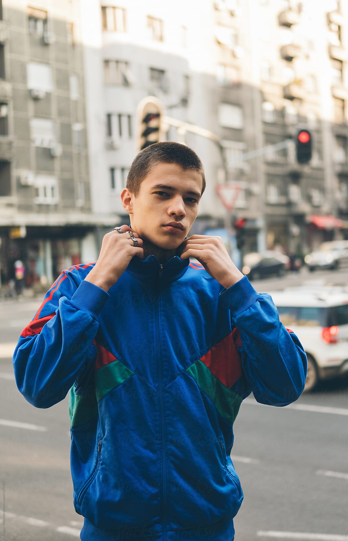 Young boy in colorful track suits from 90's in east Europe projects.
