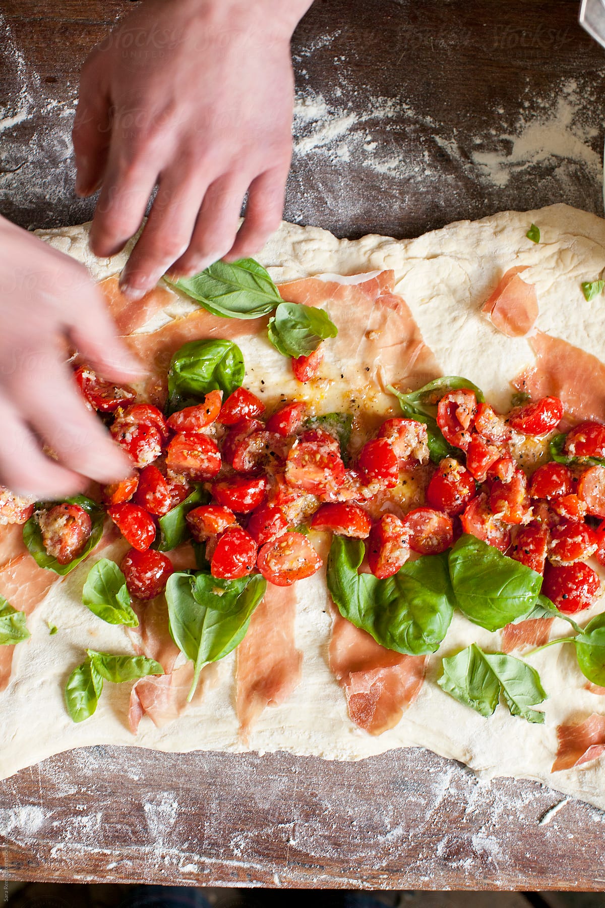 Process of Making Pizza Bread With Basil and Tomatoes