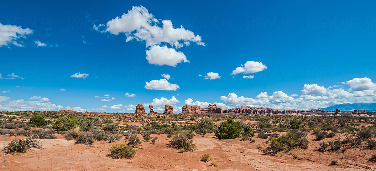 Puffy Clouds Over Arches National Park, Western Landscape Photos