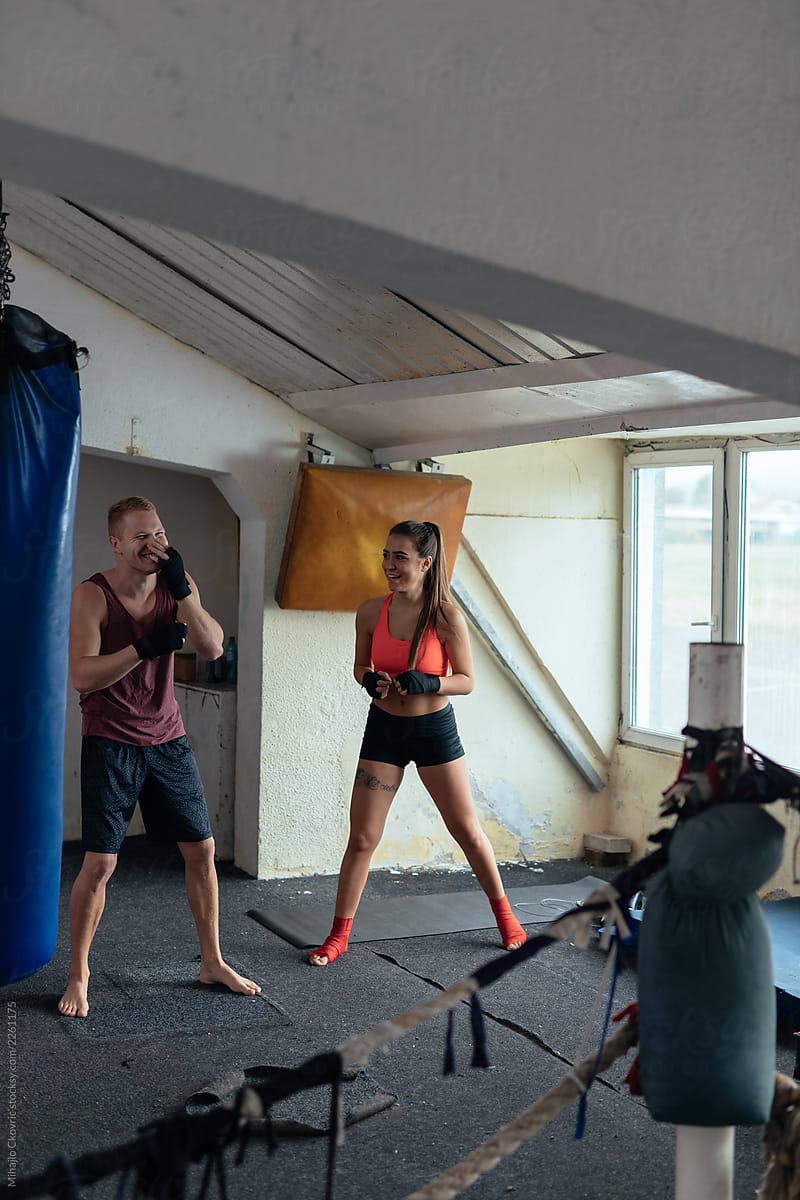 Couple getting ready for a kickbox training