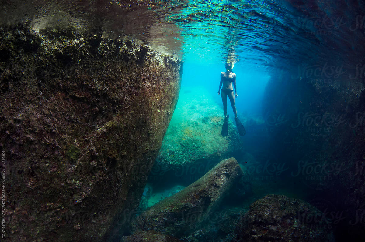 Female Diver with Reflection, Swimming in Cavern (Various Compositions)