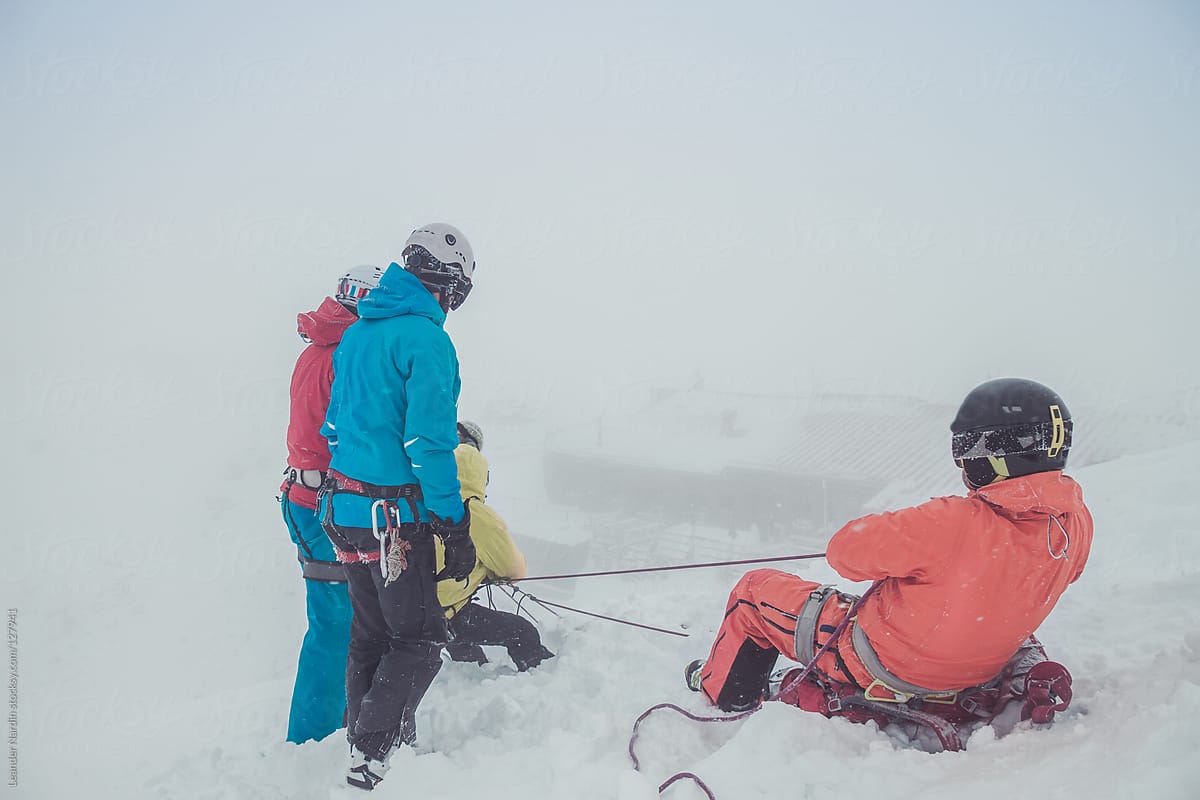 freeskier practicing emergency situation with a crevasses rescue
