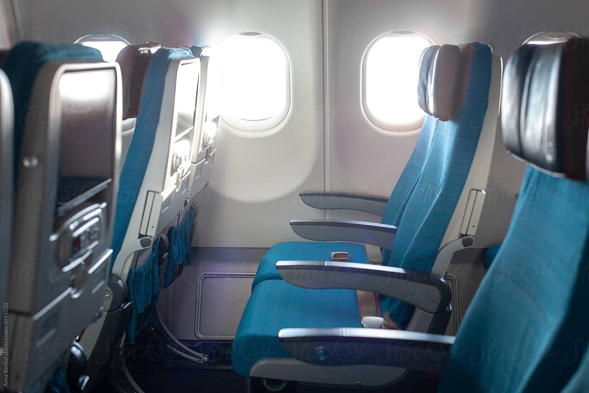 seats in economy class of passenger airplane