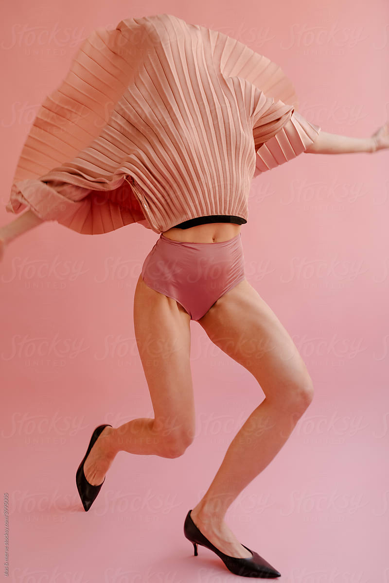 Model Lifting Her Skirt By Stocksy Contributor UM STUDIO Stocksy