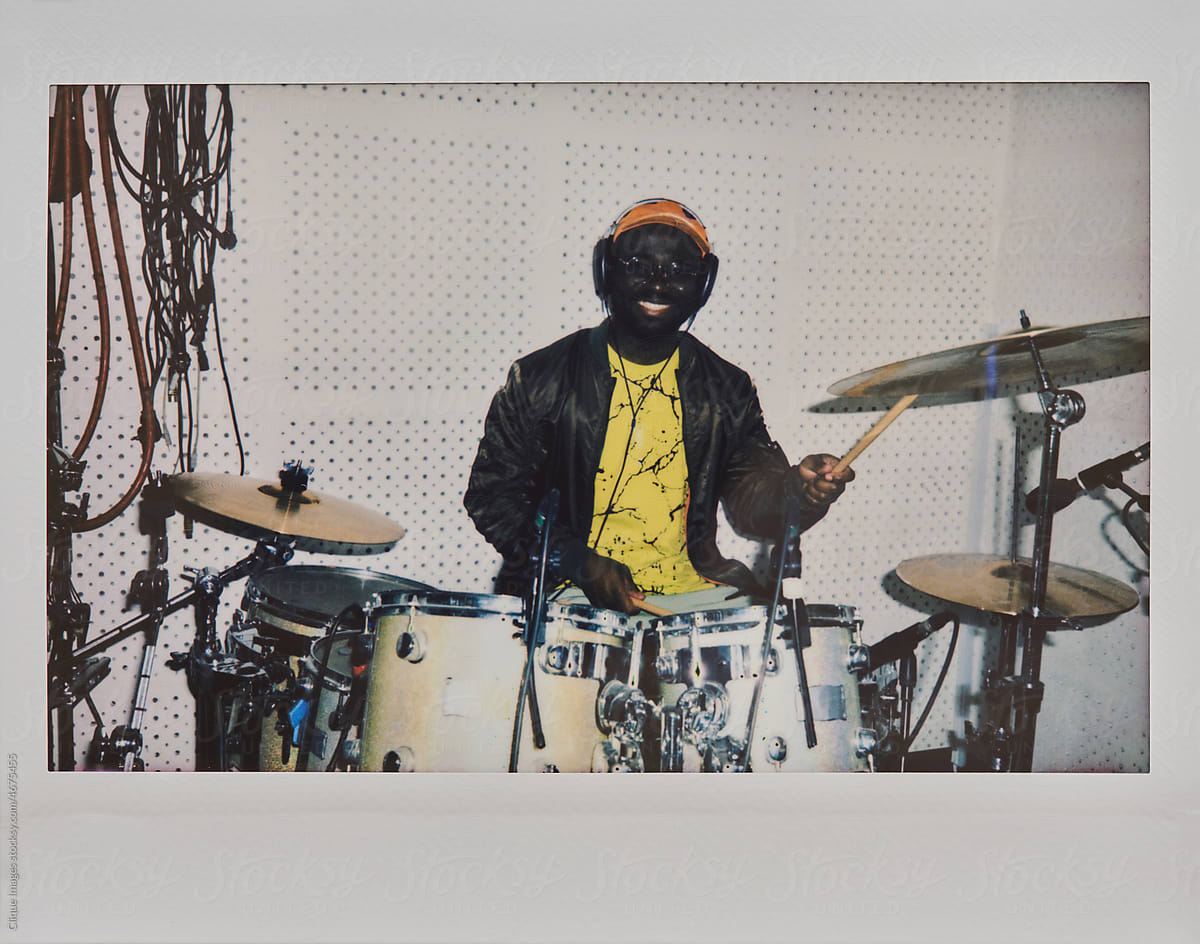Instant Photo Of Cheerful Drummer