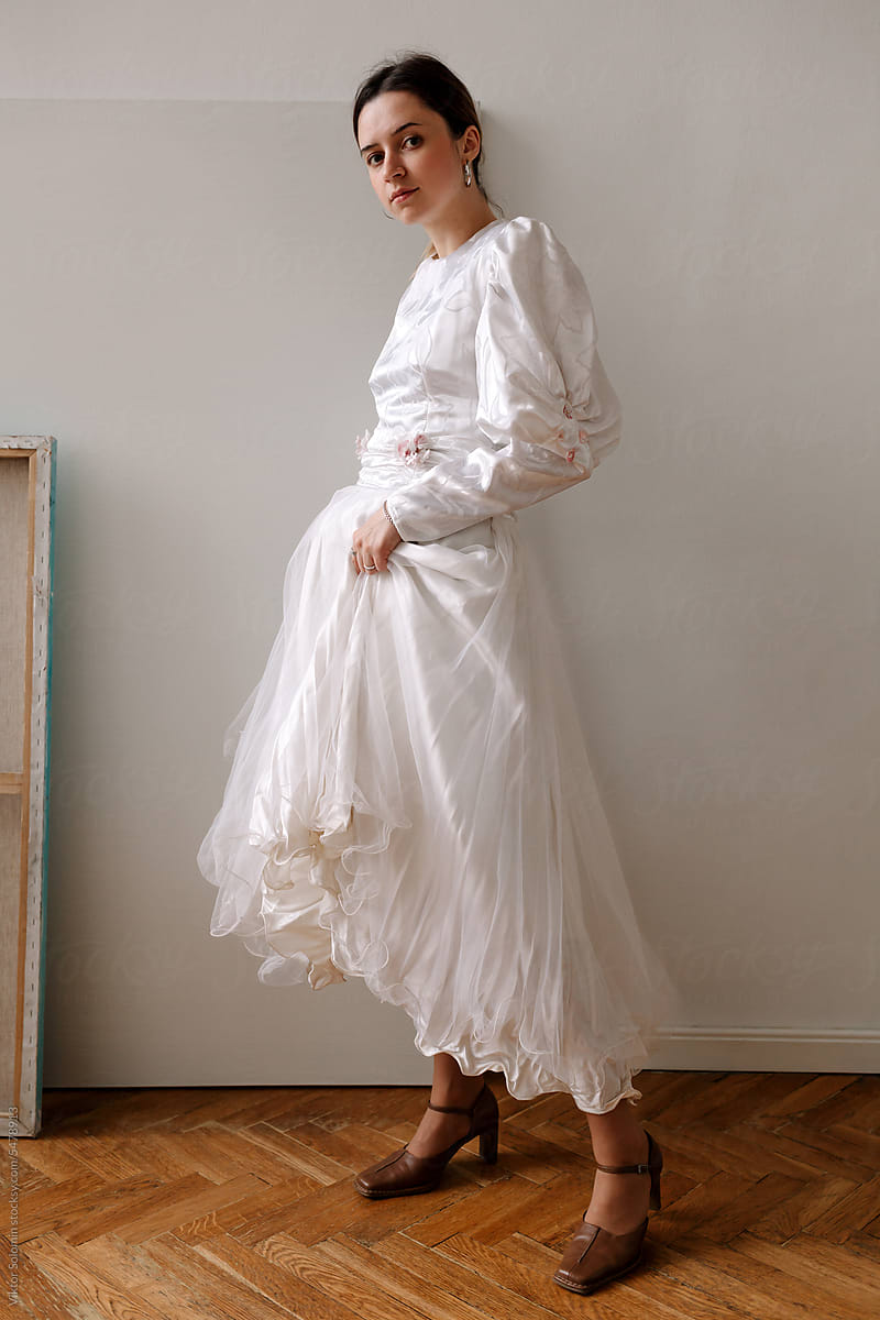 Elegant woman in white dress