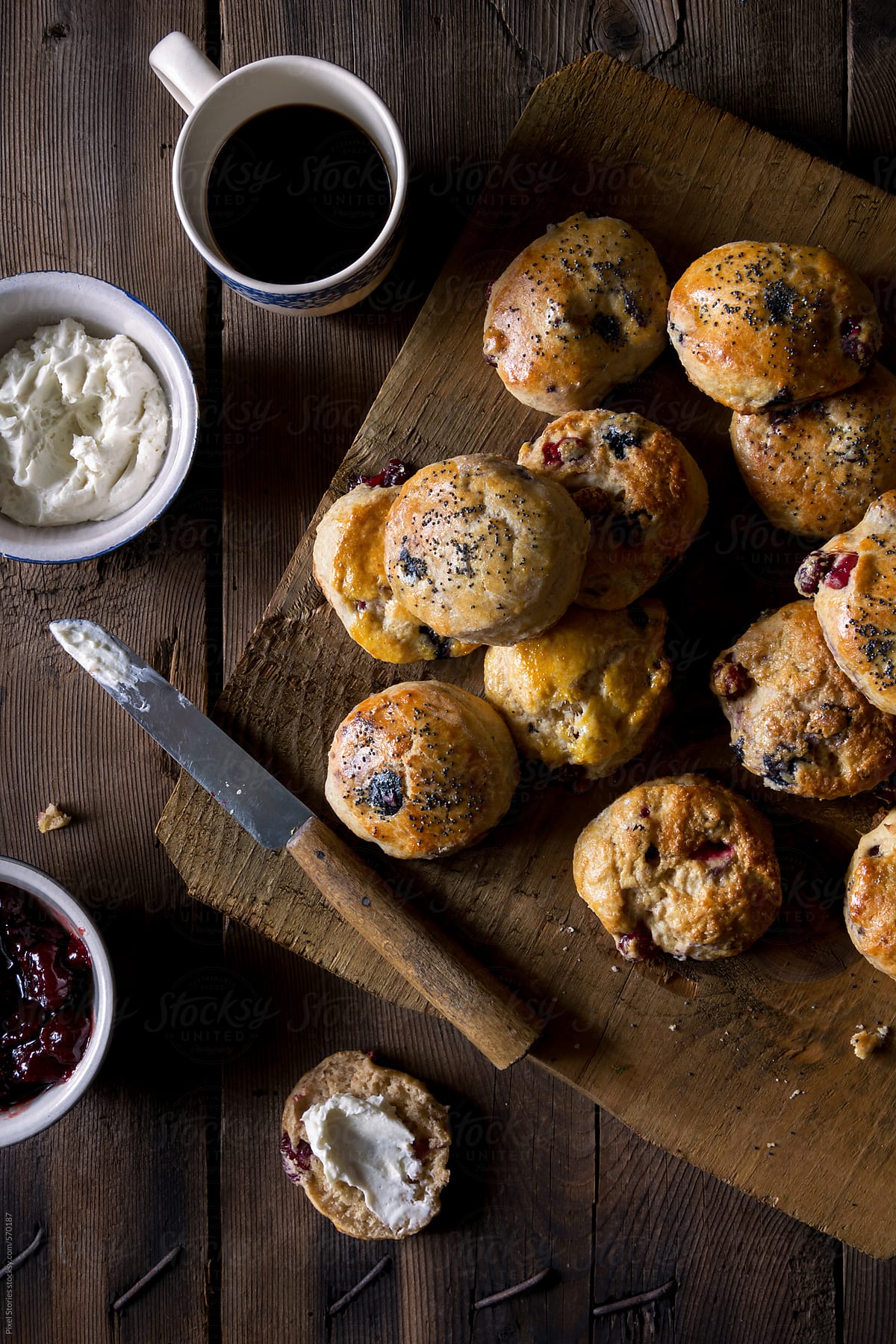 Cranberry scones on wooden table