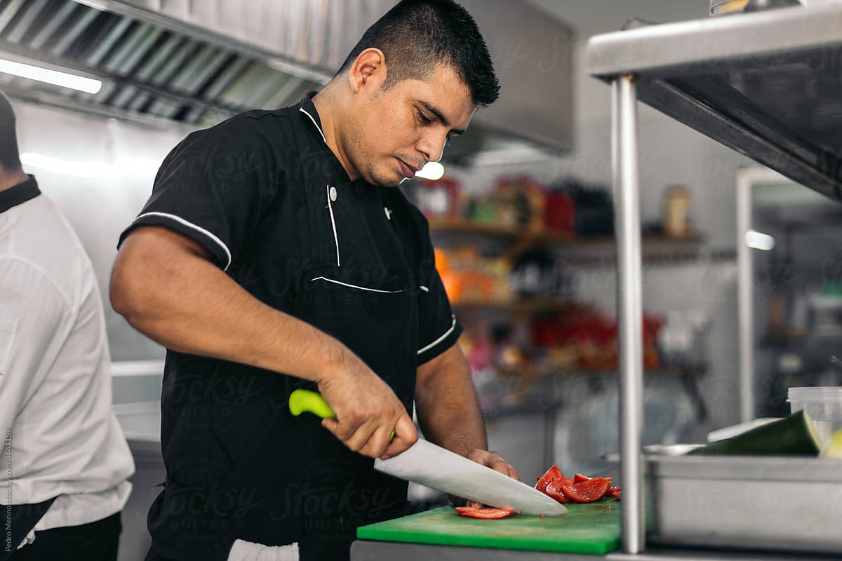 Hispanics chefs working in a restaurant kitchen