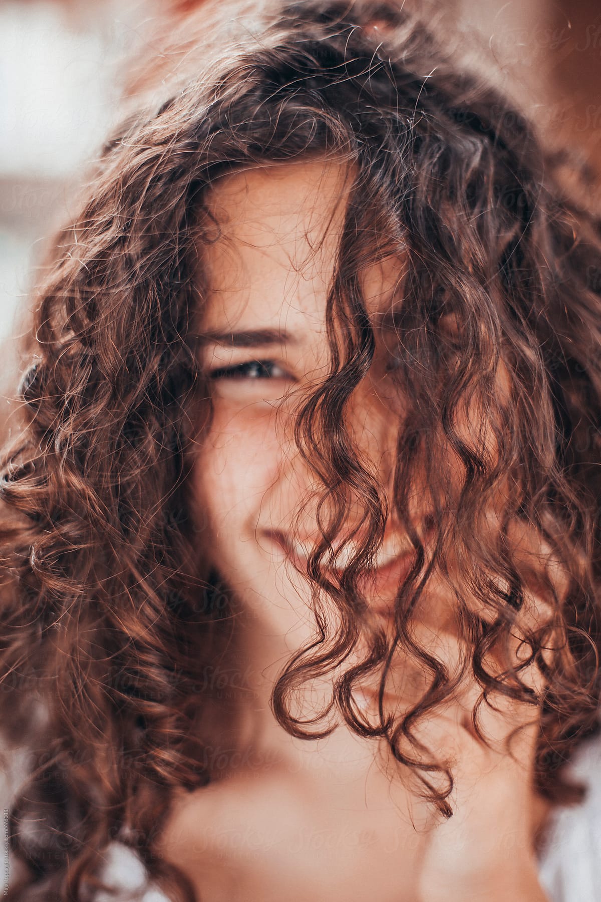 Beautiful Young Woman With Curly Hair Blue Eyes And Freckles Del