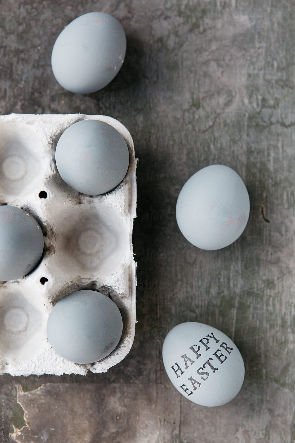 Grey easter eggs on wooden background