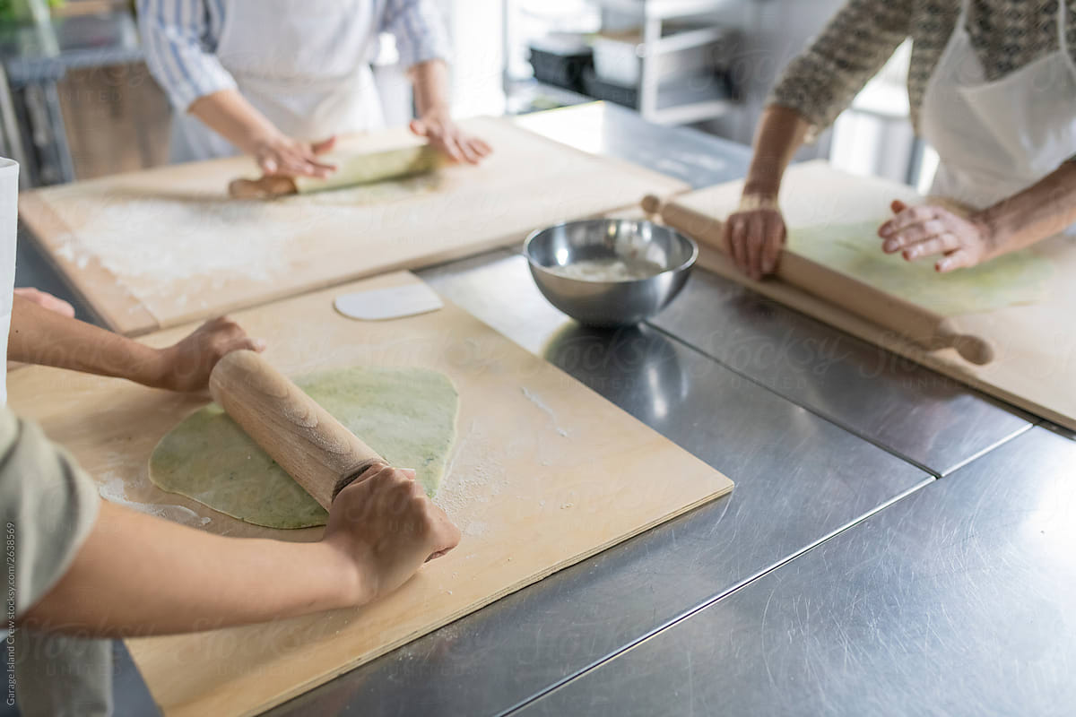 Preparing dough in a kitchen class