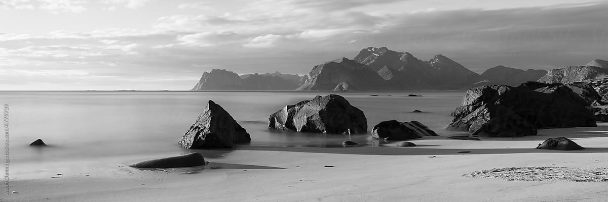 Myrland beach Midnight sun black and white lofoten islands