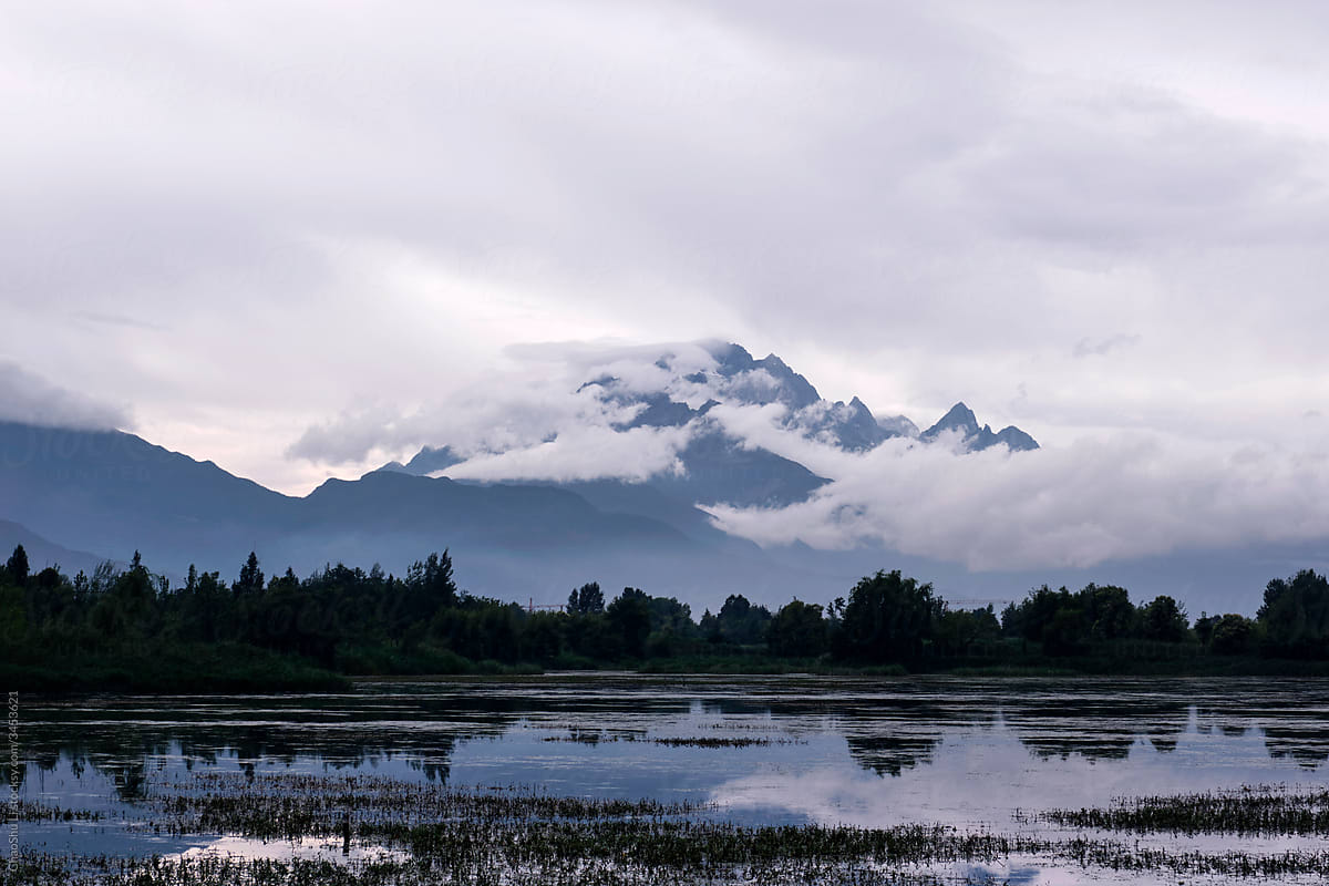 Yunlong snow mountain in the cloud, near the lake of Lijiang, Yunnan Province