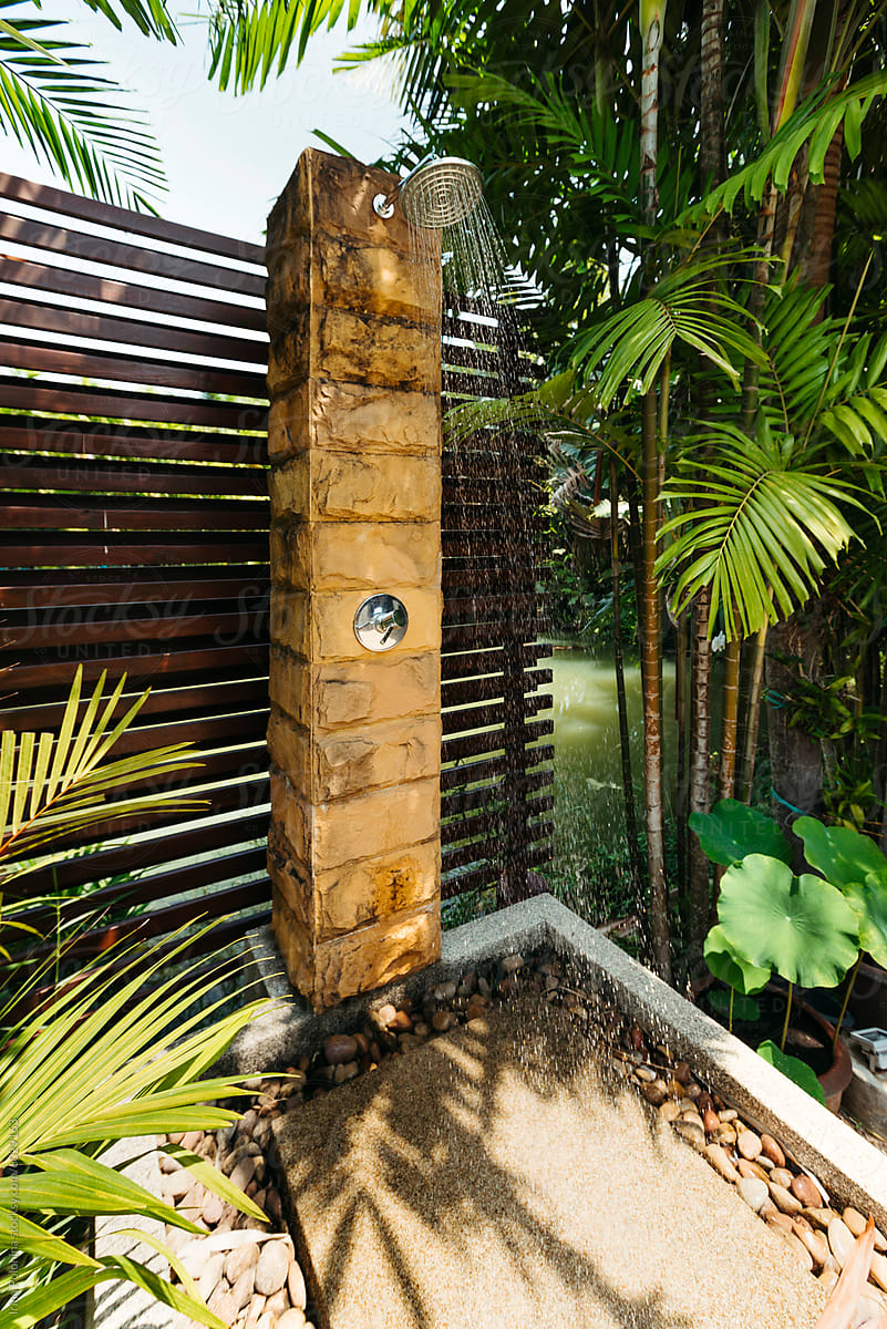 Tropical Outdoor Stone Shower at Daytime