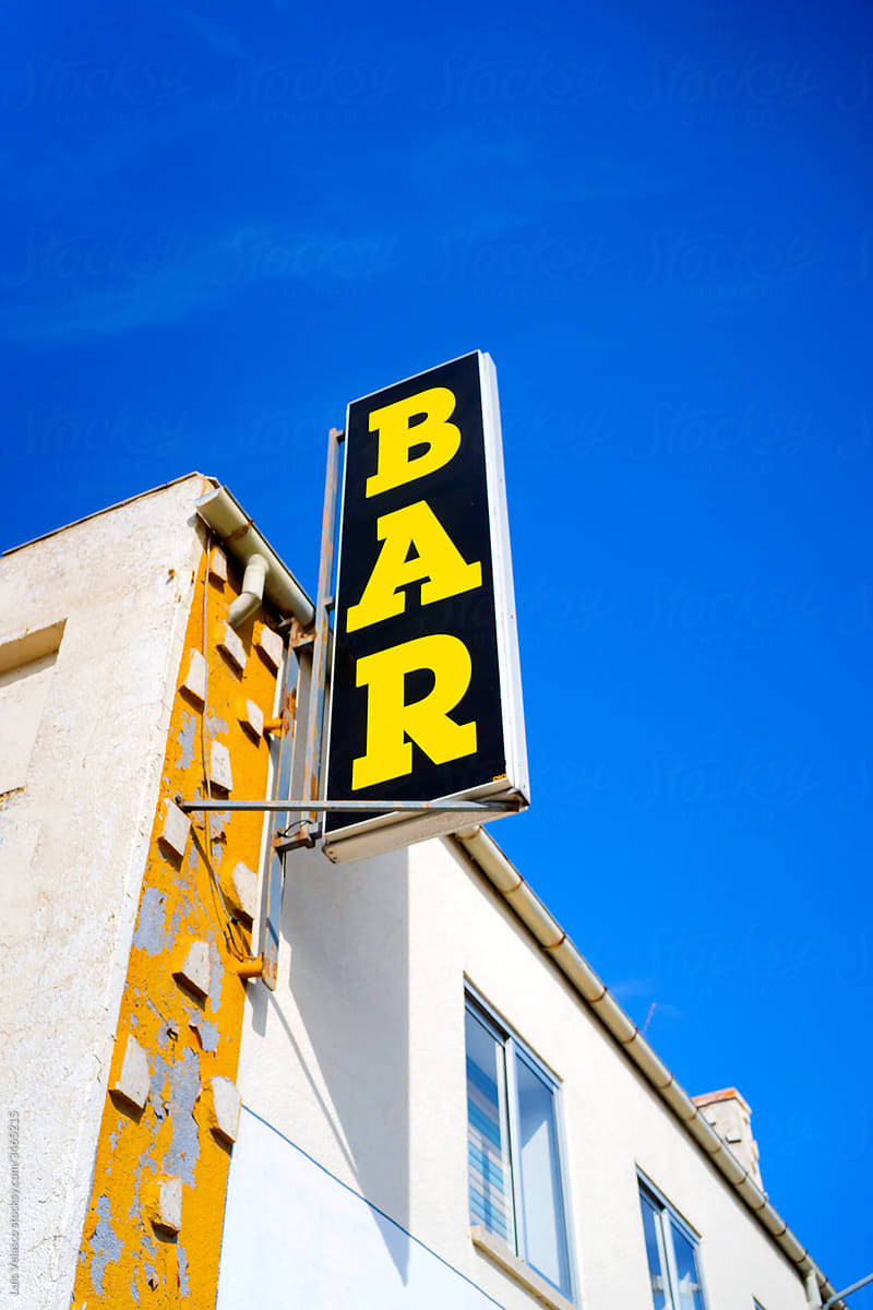 Bar Sign On The Road.